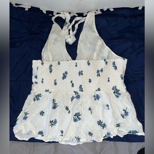 White, flowered tie neck, flowy peplum top